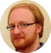 Headshot photo of Dr. Andrew Arrasmith of Rigetti Computing.