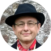 Headshot photo of Dr. Greg Kuperberg, Professor in the Department of Mathematics at University of California, Davis. 