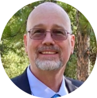 Headshot photo of Dr. Timothy Akers, Assistant Vice President for Research Innovation and Advocacy in the Division of Research and Economic Development, and Professor Public Health, at Morgan State University.