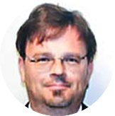 Headshot photo of Dr. Tomasz Durakiewicz, Program Director for the National Science Foundation.
